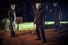 Lamb mask (L C Holt), Fox mask (Lane Hughes) and Tiger mask (Simon Barrett) in Youre Next movie review slasher horror