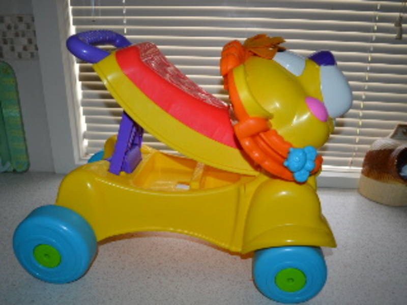 Bebekidsworld: Fisher-Price Stride-To-Ride Lion
