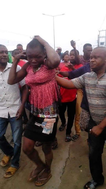  Suspected kidnapper disguised as a woman nabbed in Rivers State trying to abduct school children (photos)