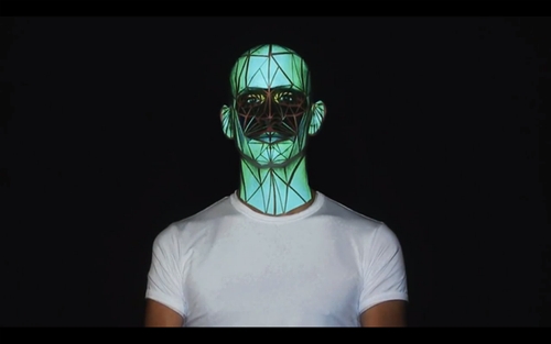 10-Human-Face-Video-Mapping-Oskar-and-Gaspar-Face-and-Tattoo-Body-Video-Mapping-Live-www-designstack-co