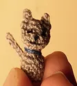http://www.ravelry.com/patterns/library/micron-the-kitty?buy=1