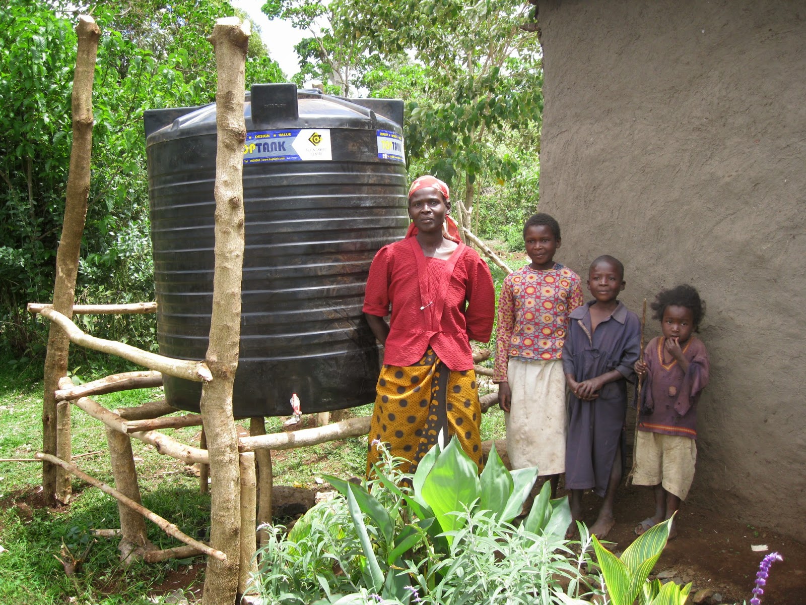 Missionary Flakes in Kenya Delivery of water tanks as part of the