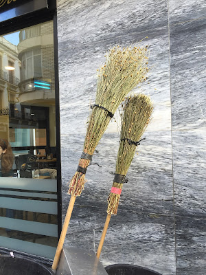 Street cleaning brooms in Ronda, Spain.