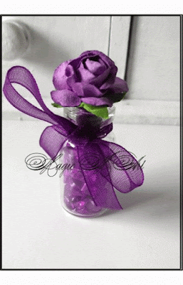 Подаръче шишенце Аметист с панделка и цвете
