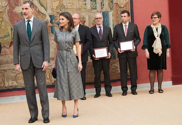 Queen Letizia wore Massimo Dutti wool check belted dress