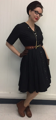 Gail Carriger in Black Cotton Day Dress with Brown Accessories 2018 