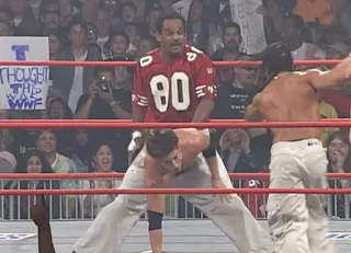 WCW Superbrawl 2000 - Team Package - Norman Smiley does the Big Wiggle on Shane Helms