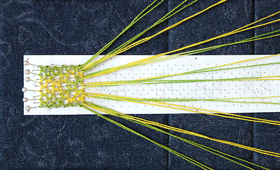 Close Up of Torchon Lace Bookmark in Progress on Bobbin Lace Pillow