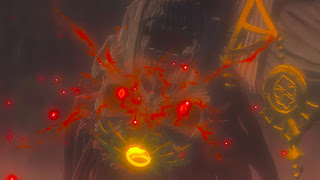 screenshot of the Breath of the Wild 2 teaser trailer, where the mummified Ganondorf looks at the viewer with glowing, red eyes