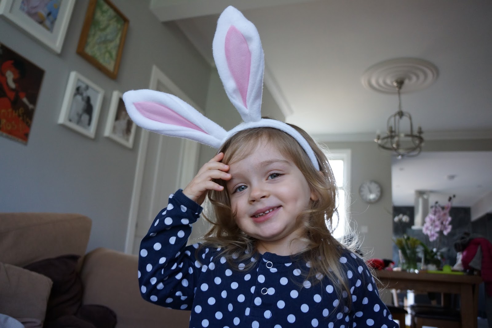 little girl with bunny ears