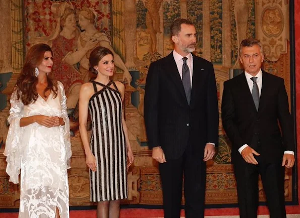 Queen letizia wore Nina Ricci Line dress, Grisogono Black Diamond Earrings, Magrit Pump. Juliana Awada wore Valentino tulle Lace gown