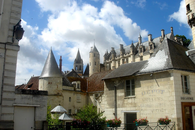 Looking up towards the Royal Lodgings over the slate roofs at Loches