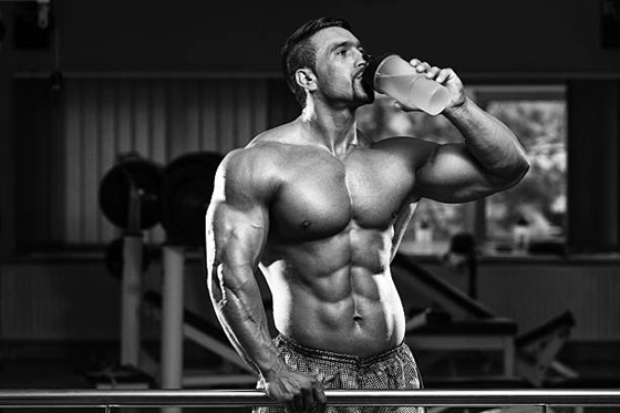 bodybuilder drinking water
