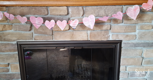 An easy newspaper heart banner craft. Perfect for #valentinesday or #february #crafts #hearts