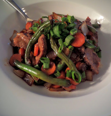 Szechuan Beef  Stir Fry:  A spicy beef stir fry, with bold flavors of ginger and garlic with just a hint of sweetness, made with leftover steak.