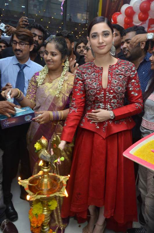 Tamannaah Bhatia In Red Dress at Tirumala Furnitures Launch
