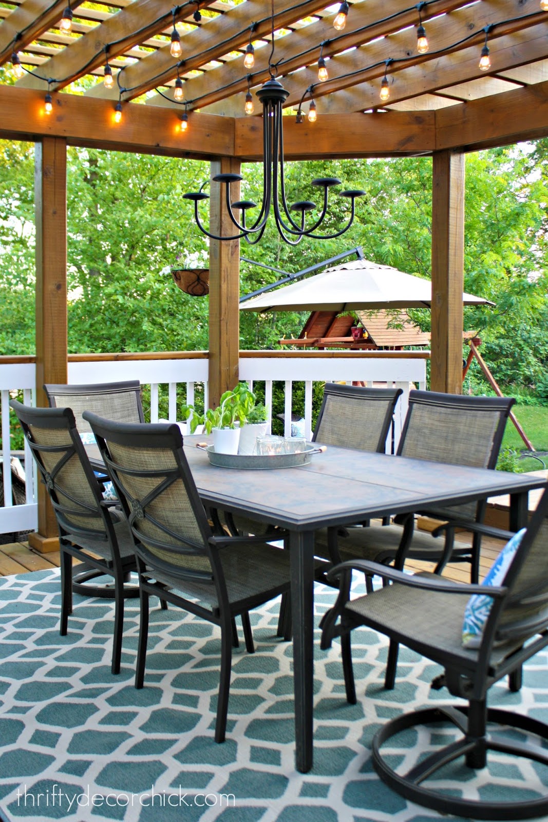 Our beautiful outdoor dining room from Thrifty Decor Chick