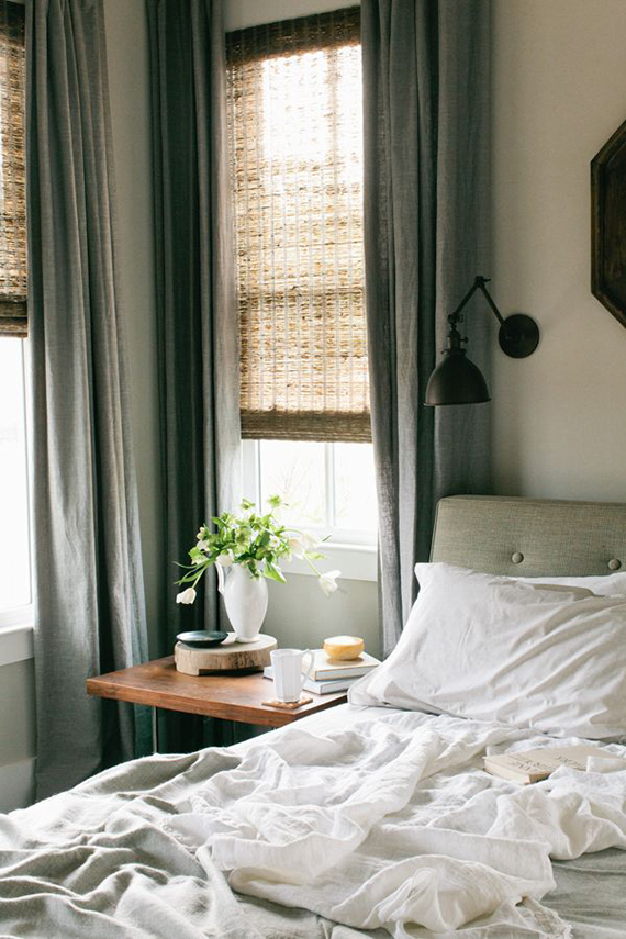 Swing arm wall lamps for the bedroom | Photo by Ali Harper via Oncewed.