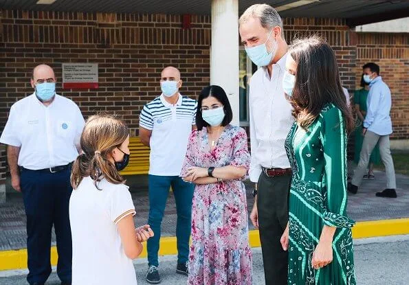 Queen Letizia wore a scarf print long dress from Sandro, and espadrille wedges from Macarena. Queen Letizia wore Sandro long dress