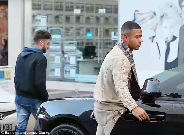 Manchester United star Memphis Depay pictured with his ?250K Rolls Royce