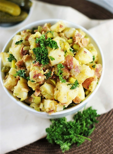 Vinegar-based German Potato Salad with bacon image ~ great served warm or chilled.