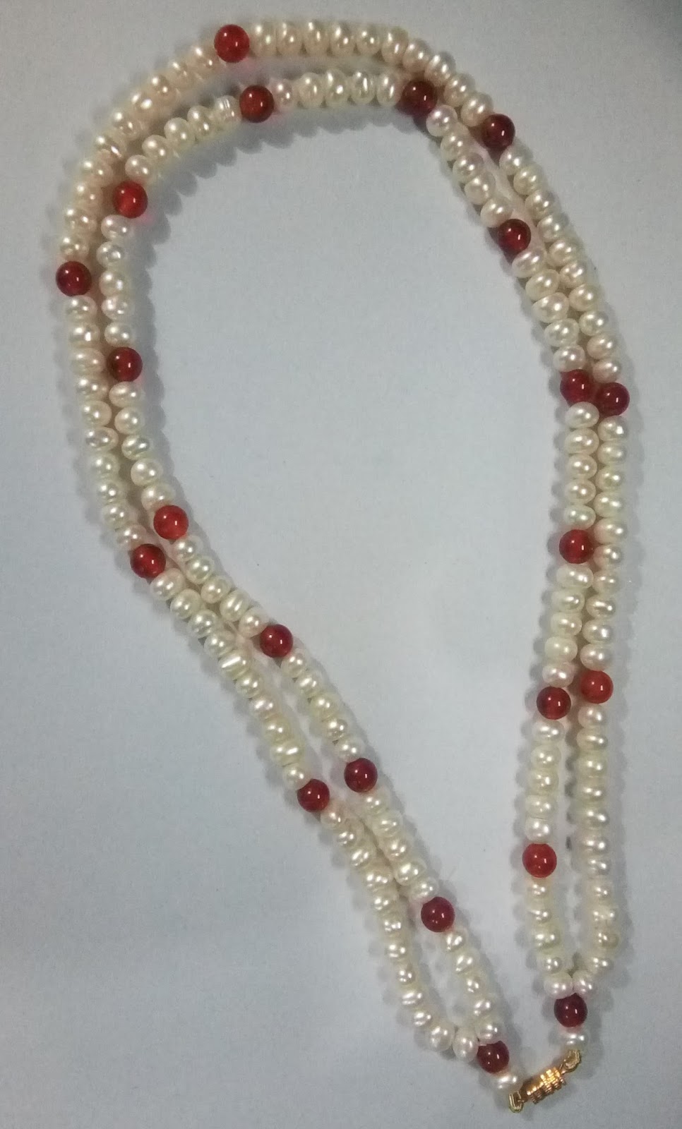 Rehnuma-e-Amliat: Pearl & Agate Gemstone Locket