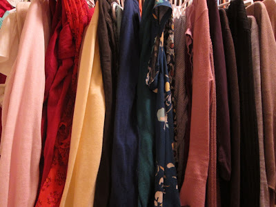 clothes arranged in rainbow order