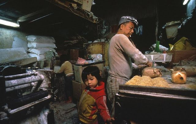Illegal noodle processing in the walled city - image from the legendary book city of darkness