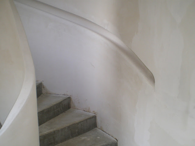 Rampe d'escalier en plâtre sur mesure