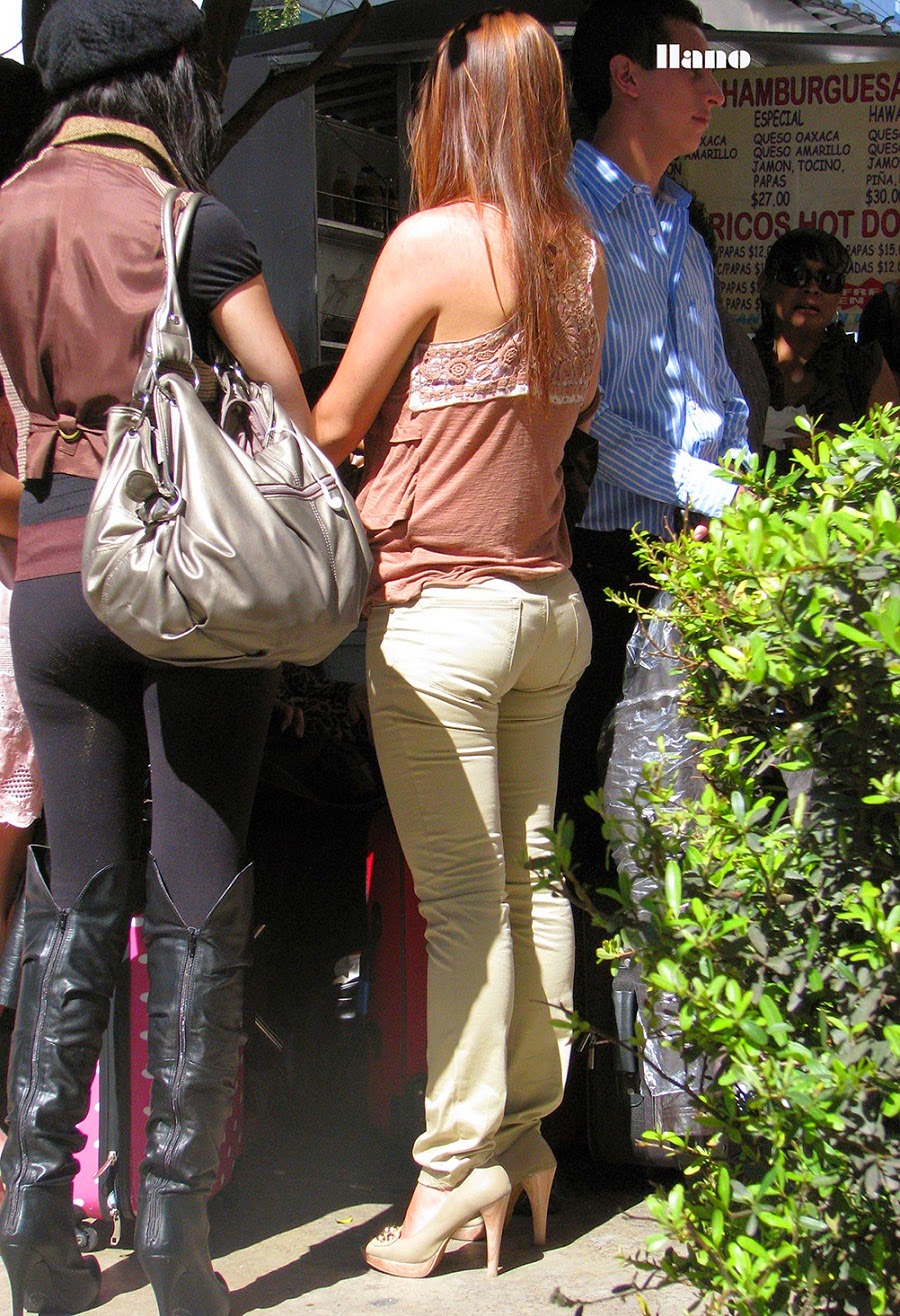 Sexy girls on the street, girls in jeans, spandex and leggings, tight