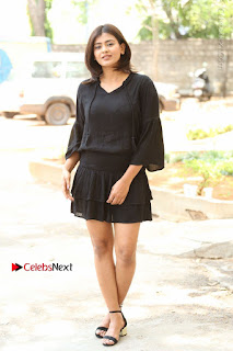 Actress Hebah Patel Stills in Black Mini Dress at Angel Movie Teaser Launch  0005