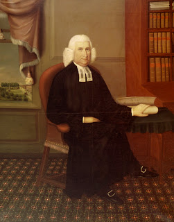 A painting of a seated Eleazar Wheelock.