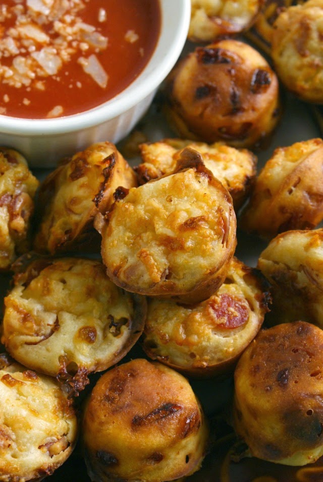 Pepperoni Pizza Puffs | thetwobiteclub.com | Dip them in a little pizza sauce and they're itty bitty bites of pizza heaven!