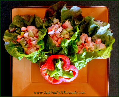 Fruited Chicken Lettuce Wraps, chicken, fresh fruits and veggies in a light sauce rolled into lettuce leaves | Recipe developed by www.BakingInATornado.com | #recipe #salad
