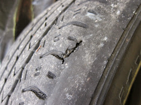 wear on sidewall of tires, hole, puncture