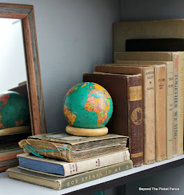 antique books add interest to a bookshelf