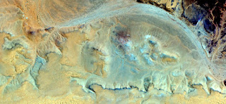 Plying the river turquoise sulfur yellow sands of the African desert,abstract photograph of the deserts of Africa from the air,Naturalism Series Abstract of Munimara,textures green and yellow stone Plying the river turquoise sulfur yellow sands of the African desert,abstract photograph of the deserts of Africa from the air,
