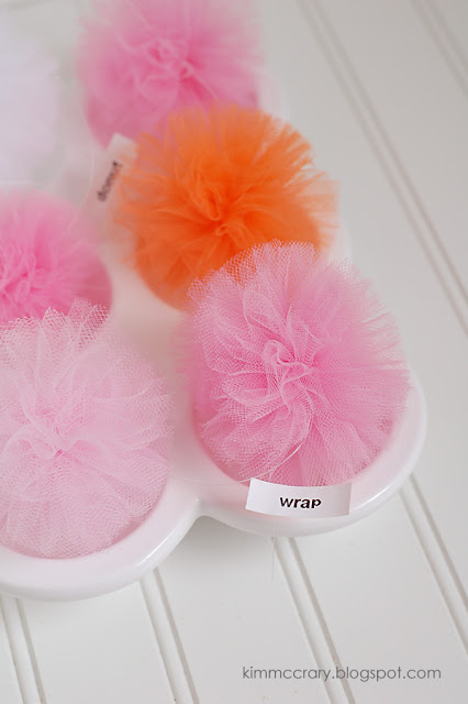 I experimented with multiple ways to make DIY pom poms, but here's the simplest way that created the best pouf.