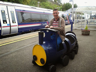 'Driving' a little train at Falkirk High station