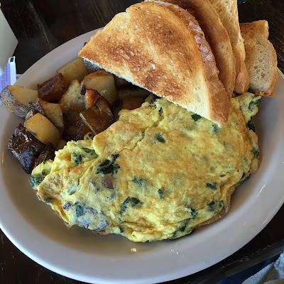 Hearty omelette full of spinach and mushrooms at Otto's Place in Galena, Illinois to start the day.