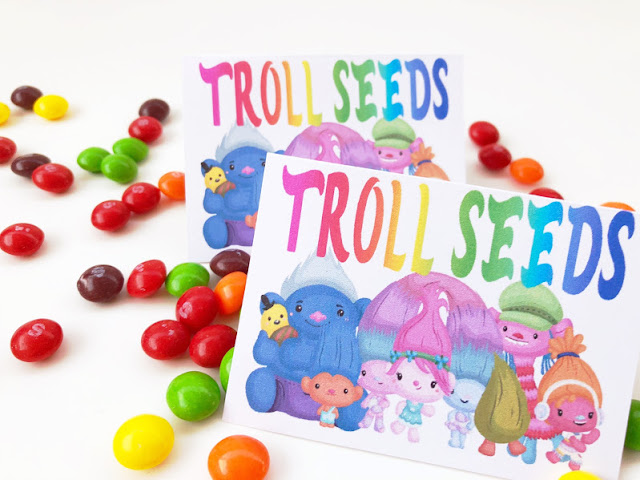 These Troll Seeds bag toppers are the perfect give for our Trolls birthday party! They are quick and easy to put together and so stinkin' cute. Print them out for free now and bring a smile with Princess Poppy and the Trolls squad.