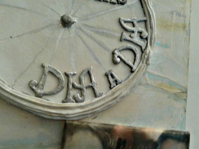 dedicatoria en relieve sobre cuadro