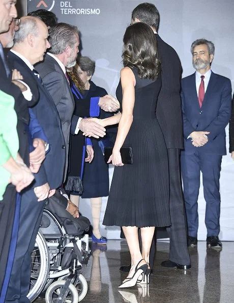 Queen Letizia wore Boss micro sleeveless plisse dress. Hugo Boss Dionia fit and flare dress