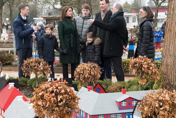 Prince Joachim, Princess Marie, Princess Athena, Prince Henrik and Prince Felix at opening of LEGOLAND Billund. Theory Oaklane green coat