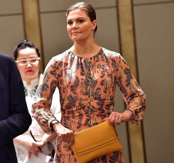 Crown Princess Victoria wore H&M print silk dress H&M Conscious Exclusive at Sweden-Vietnam Business Summit 