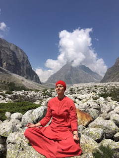 Sitting in blissful Himalayan meditation by Lakshmi Van is Swami Shivjyoti