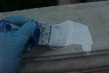 Use a good quality brush to paint the primer over the cement