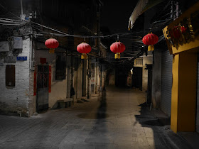 lanterns hanging on a old street in Jiangmen
