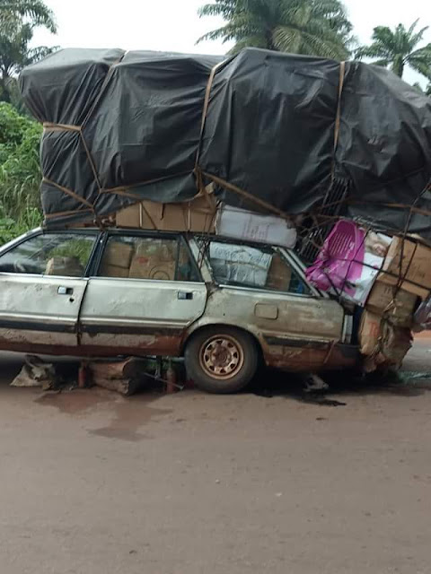 Photos of a ridiculously overloaded small vehicle heading to Benue from Onitsha Main Market