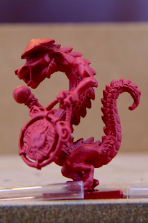 Dragon Team Coach dragon with a gong